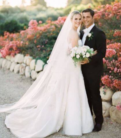 Logan Page parents Samuel Page and Cassidy Boesch on their wedding.